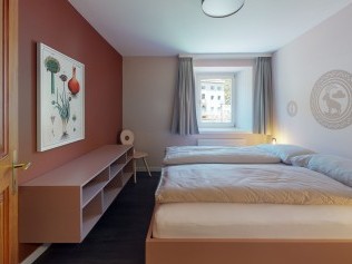 Schlafzimmer - Reka-Ferienanlage Chesa Engadina Madulain