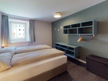 Schlafzimmer - Reka-Ferienanlage Chesa Engadina Madulain