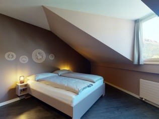Schlafzimmer - Reka-Ferienanlage Chesa Engadina Madulain