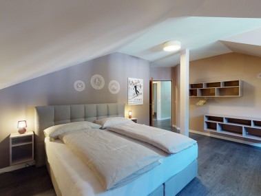 Schlafzimmer - Reka-Ferienanlage Chesa Engadina Madulain