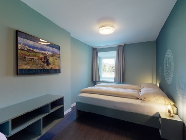 Schlafzimmer - Reka-Ferienanlage Chesa Engadina Madulain