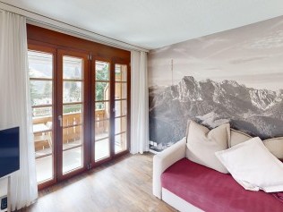 Wohnzimmer mit Essbereich - Reka-Ferienanlage Rougemont