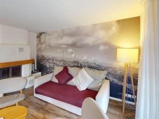 Wohnzimmer mit Essbereich - Reka-Ferienanlage Rougemont