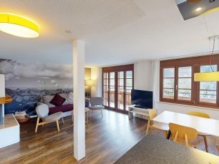 Wohnzimmer mit Essbereich - Reka-Ferienanlage Rougemont