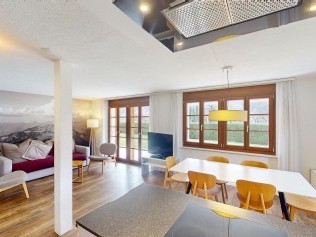 Wohnzimmer mit Essbereich - Reka-Ferienanlage Rougemont