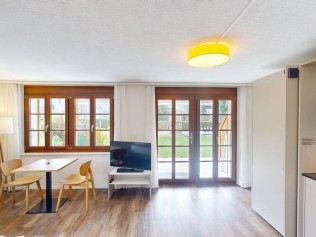 Wohn- und Schlafzimmer - Reka-Ferienanlage Rougemont