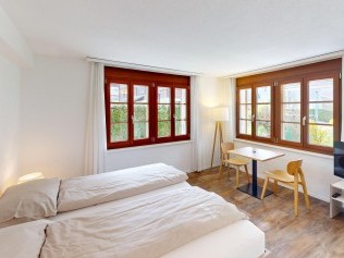Wohn- und Schlafzimmer - Reka-Ferienanlage Rougemont
