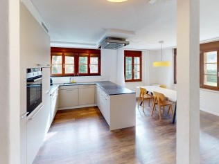 Wohnzimmer mit Essbereich - Reka-Ferienanlage Rougemont