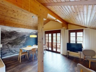 Wohnzimmer mit Essbereich - Reka-Ferienanlage Rougemont