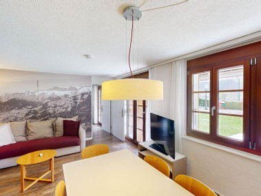 Wohnzimmer mit Essbereich - Reka-Ferienanlage Rougemont