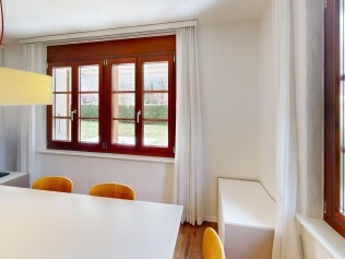 Wohnzimmer mit Essbereich - Reka-Ferienanlage Rougemont