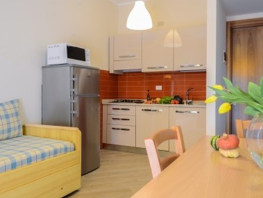 Wohnzimmer mit Essbereich - Residence Dei Fiori