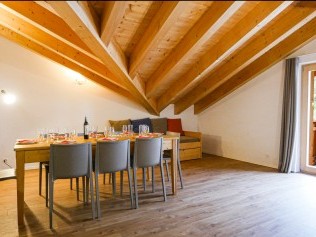 Wohnzimmer mit Essbereich - T-Resort