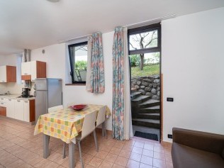 Wohnzimmer mit Essbereich - Residence Primera