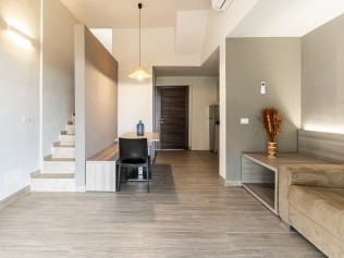 Wohnzimmer mit Essbereich - Residence Solemaremma