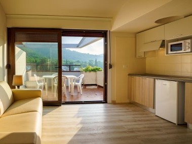 Wohnzimmer mit Essbereich - Residence Solemaremma