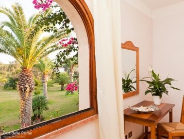 Living room with dining area - Residence Baia delle Palme
