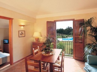 Wohnzimmer mit Essbereich - Residence Baia delle Palme