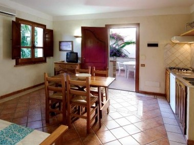 Living room with dining area - Residence Baia delle Palme