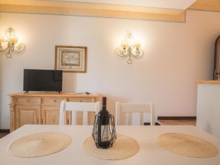 Wohnzimmer mit Essbereich - Residenz Il Giardino degli Oleandri