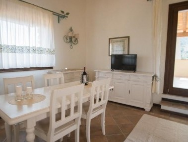 Living room with dining area - Residenz Il Giardino degli Oleandri