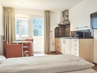 Wohn- und Schlafzimmer - Solaria Serviced Apartments
