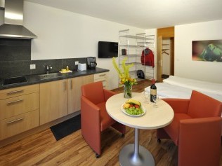 Wohn- und Schlafzimmer - Solaria Serviced Apartments