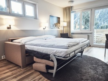Wohn- und Schlafzimmer - Solaria Serviced Apartments