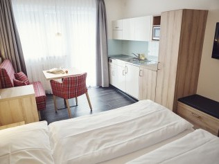 Wohn- und Schlafzimmer - Solaria Serviced Apartments