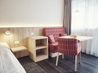Wohn- und Schlafzimmer - Solaria Serviced Apartments