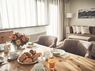 Wohnzimmer mit Essbereich - Solaria Serviced Apartments