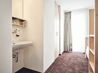 Schlafzimmer - Solaria Serviced Apartments