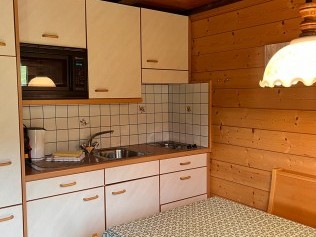 Küche mit Essbereich - Sport Resort Fiesch