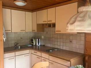 Küche mit Essbereich - Sport Resort Fiesch