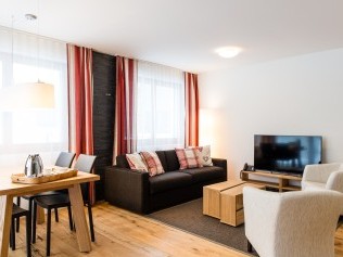 Salon avec coin repas - Titlis Resort