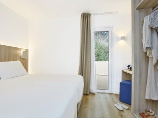 Schlafzimmer - Universal Aparthotel Don Camillo